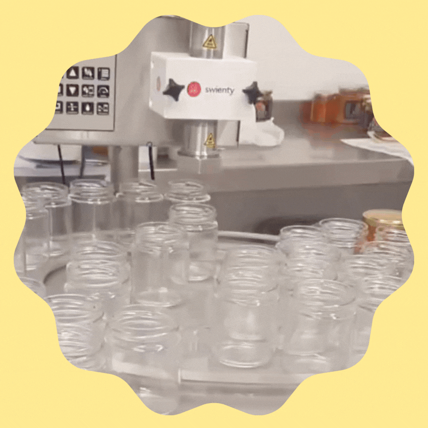 Honey being put into jars